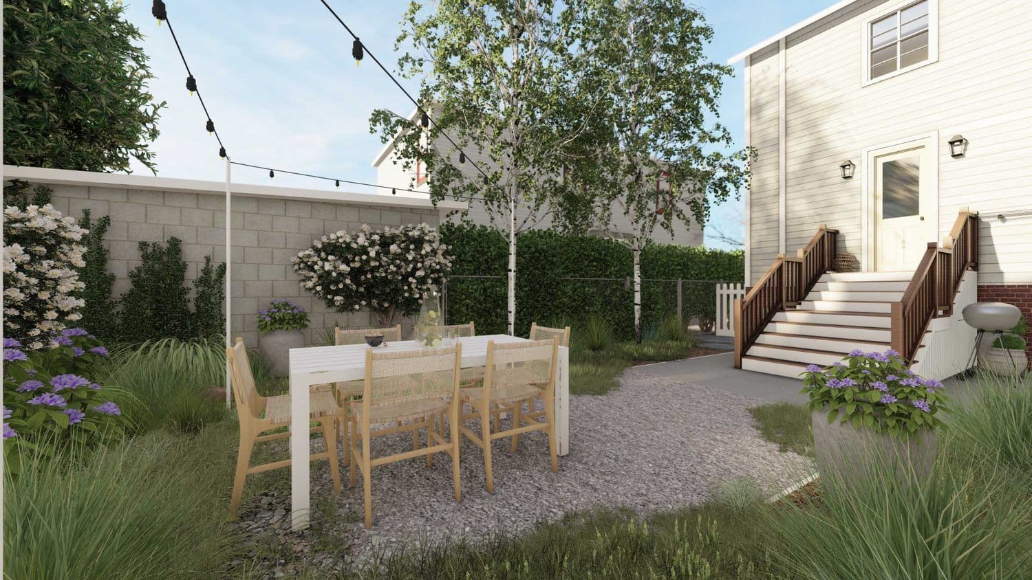 Cambridge backyard with gravel floors and dining area with plants