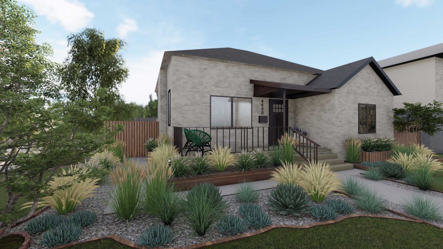 Lakewood frontyard with plants in gravel, concrete pathway, and low armchairs on deck