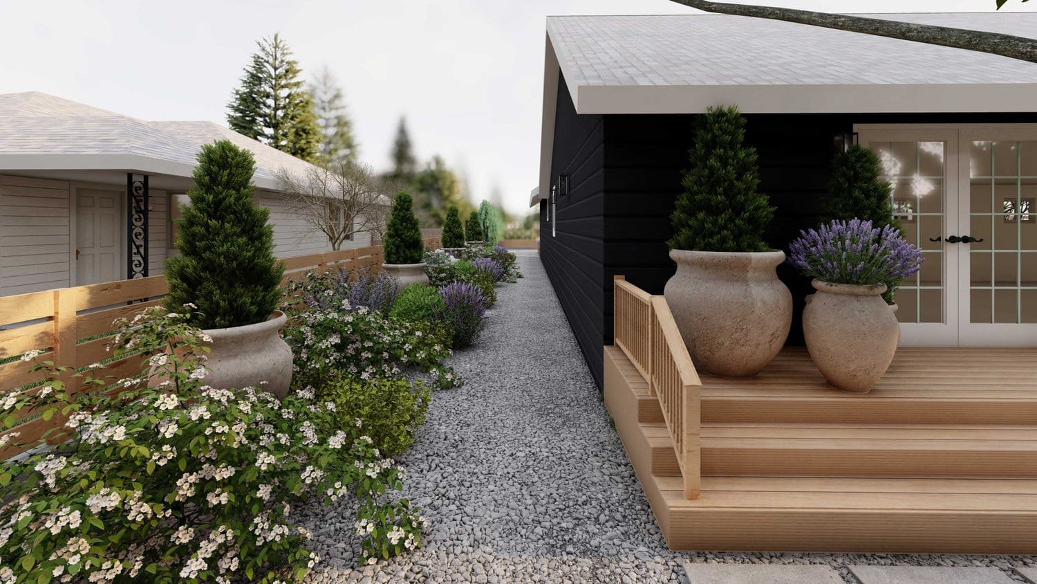 Twin Falls side yard showing gravel ground-covering with flowers and planters, and half view of decked front porch